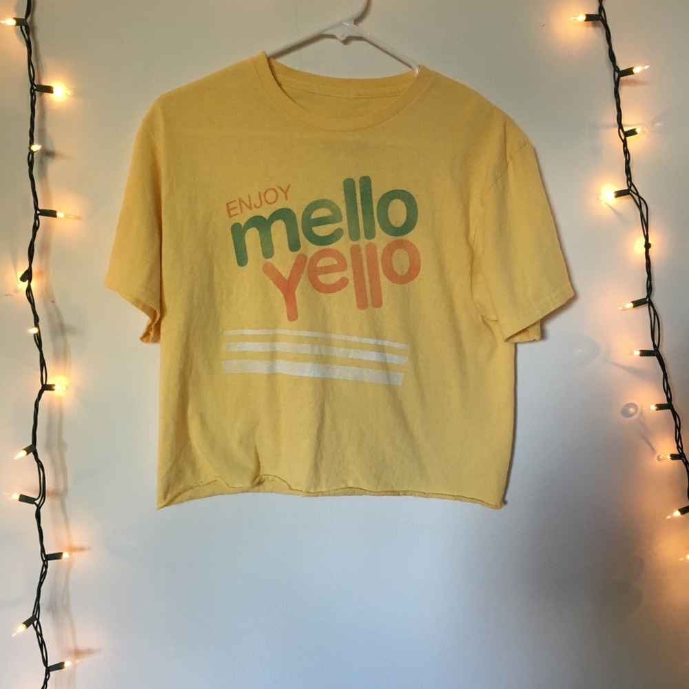 Yellow cropped T-shirt that says